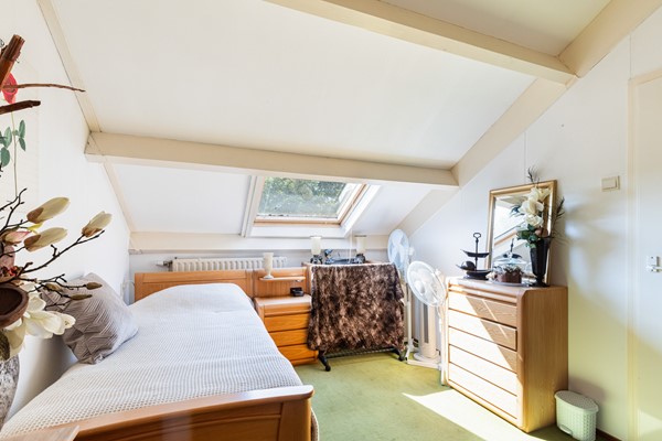 Foto - Te koop: Goed onderhouden tussenwoning in rustige woonwijk!